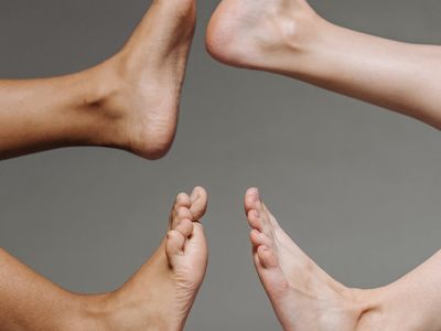 Close up of feet in a balance pose.