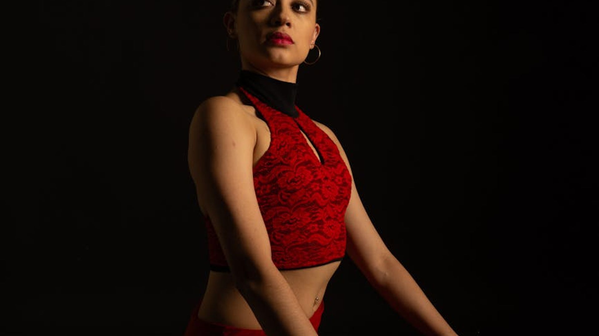 Serene yoga studio with dim lighting and warm highlights.